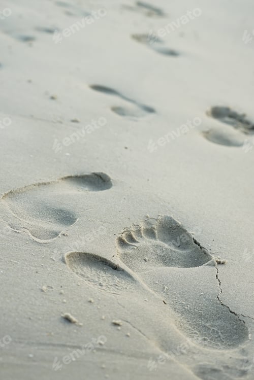 Preview: Closeup footprints in the sand