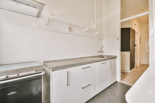 Preview: Interior of modern kitchen with white furniture