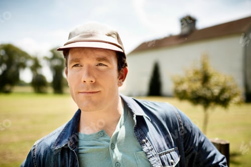 Preview: A man in a baseball cap on an organic farm in New York State.