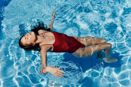Preview: Girl pool female lifestyle sport person swim blue underwater summer water