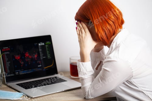 Preview: Woman with sadness watching the map of the spread of the coronavirus world