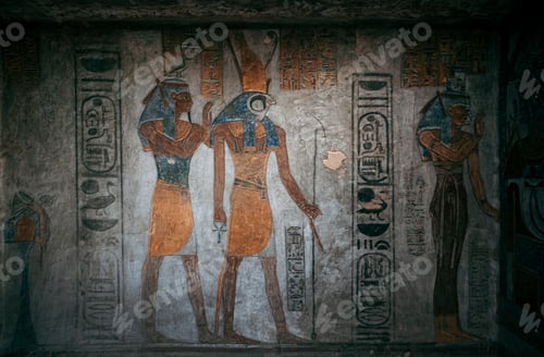 Preview: Ancient Egyptian wall carvings depicting deities with hieroglyphics, showcasing historical art