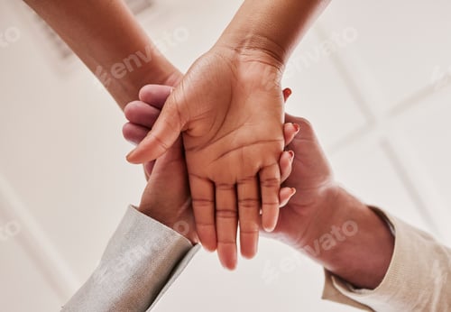 Preview: People, hands together and unity below in trust for community, agreement or teamwork at the office.
