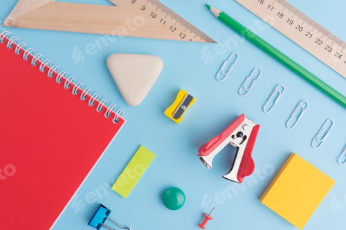 Preview: Office supplies on the blue background table