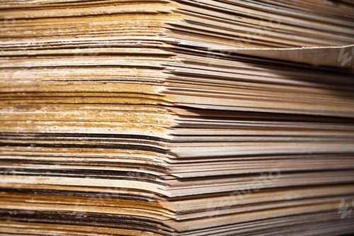 Preview: Plywood Stacks Showcasing Different Layers and Textures in a Manufacturing Facility