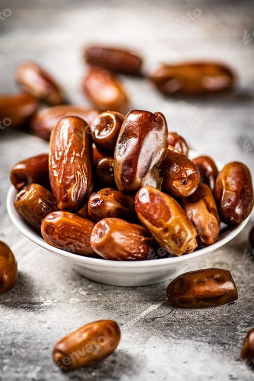 Preview: Full bowl with dates on the table.
