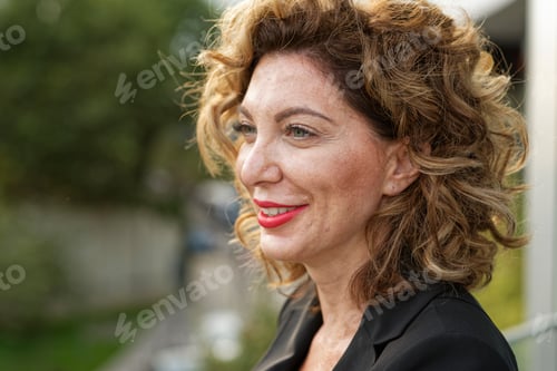 Preview: Woman with blond curls, Milano, Italy.
