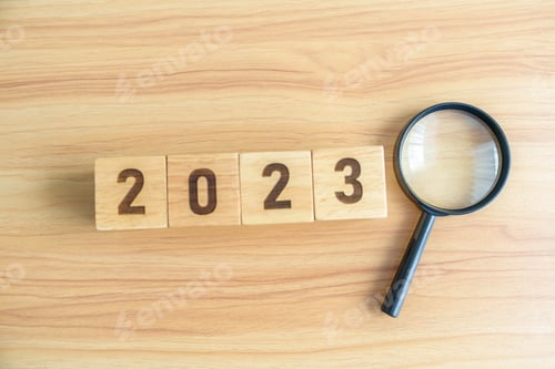 Preview: 2023 block with magnifying glass.