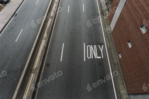 Preview: Elevated View of Urban Roadway Markings and Building