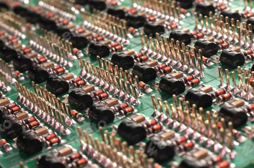 Preview: Close-up side view of a PCB board with SMD components