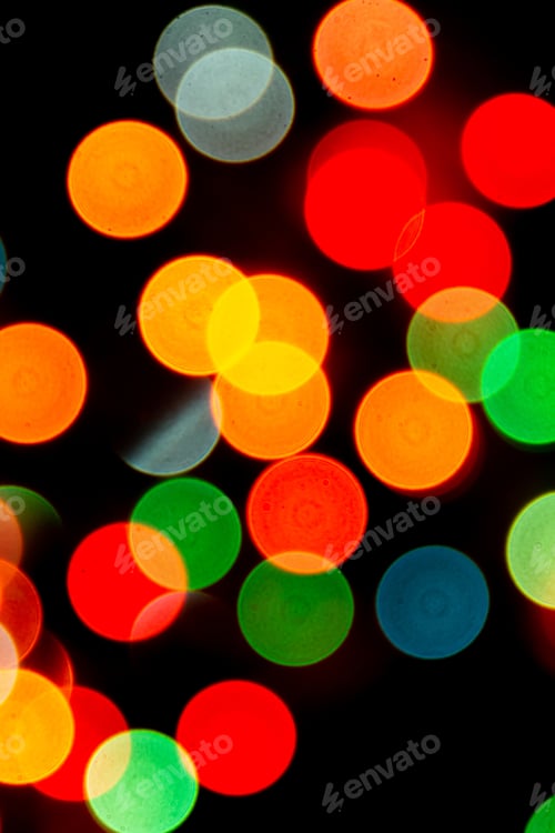 Preview: blurred defocused christmas lights bokeh on a black background