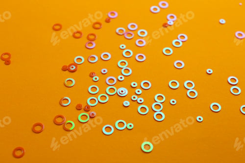 Preview: Shiny bright glitter on pale orange background