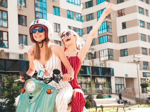 Preview: Two young beautiful woman posing outdoors