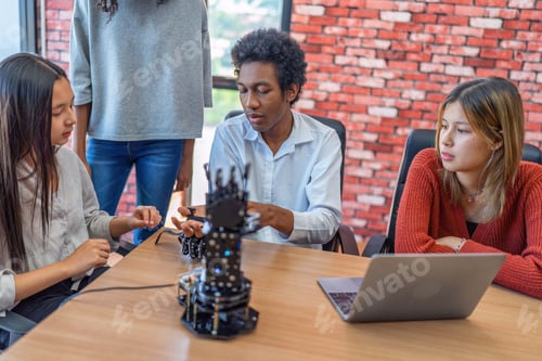 Preview: Teenager children learning with new innovation robotic hand interface hand control in classroom