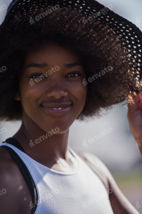 Preview: Close up portrait of a beautiful young african american woman sm