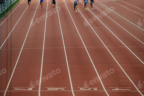 Preview: group athletes sprinters finish running at stadium