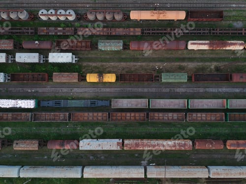 Preview: Aerial view of a cargo trains. Colorful freight trains on the railway station. Heavy industry.