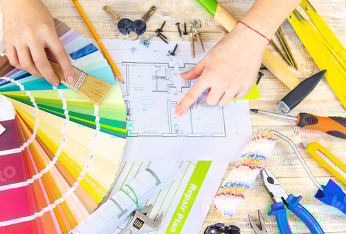 Preview: Paint palette house plan and repair tools. Selective focus.