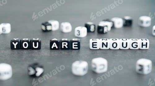 Preview: You are enough slogan in black bead letters. Motivation inspiration self confidence concept