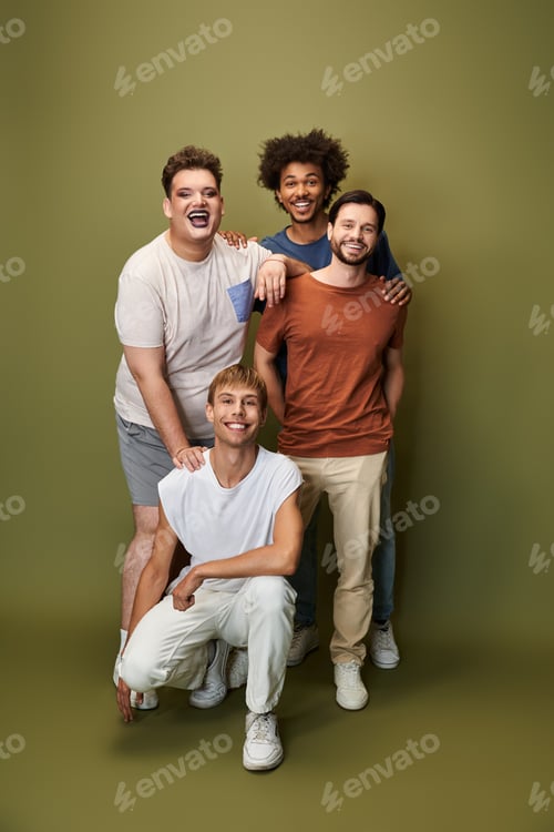 Preview: Four confident men celebrating queer pride in a vibrant studio setting with a green backdrop