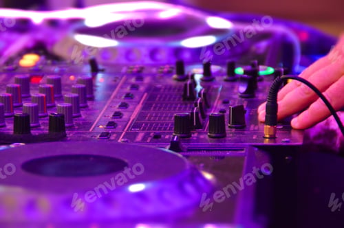 Preview: Disc jockey’s hand while mixing music