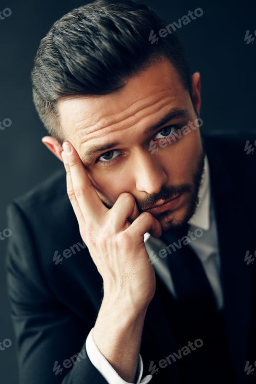 Preview: Thoughtful handsome man portrait