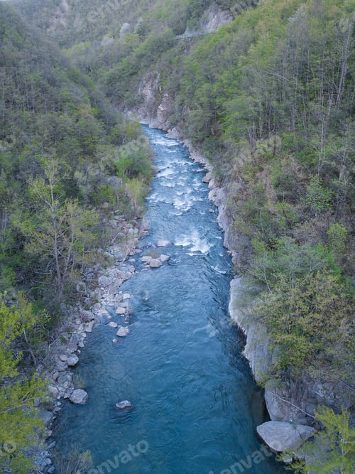 Preview: aerial view of streaming forest river surrounded with hills, Cyprus
