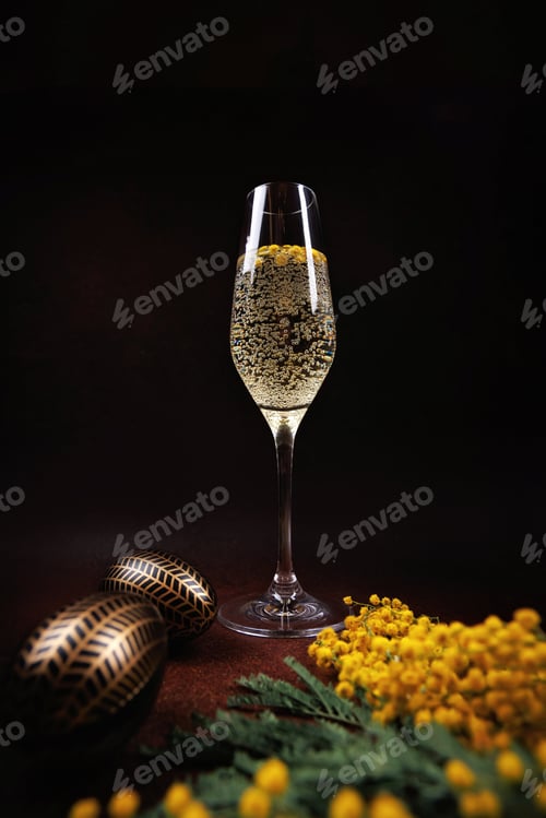 Preview: Festive Easter table with champagne, mimosa, and golden eggs