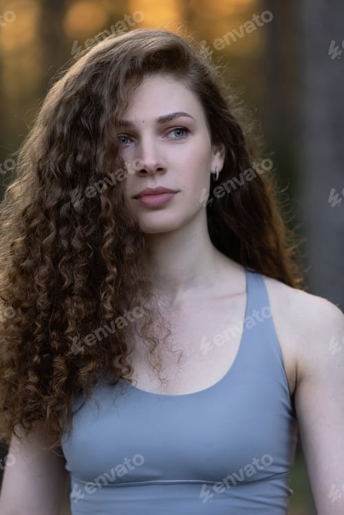 Preview: Young, beautiful skinny brunette posing in a forest grove. Young country girl in a classic sundress
