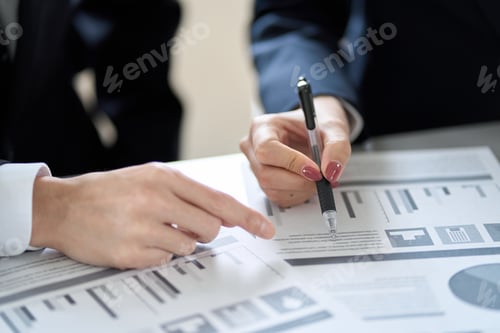 Preview: Asian business person having a meeting with materials