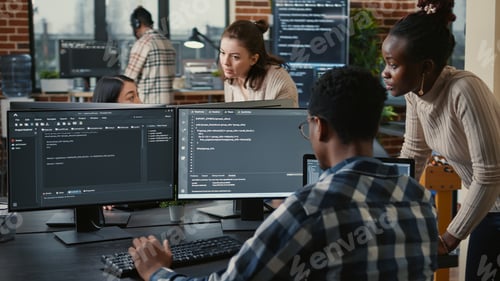 Preview: Mixed team of artificial intelligence cloud programers talking about programming in front of