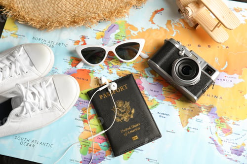 Preview: Tourist items on world map, above view. Travel agency