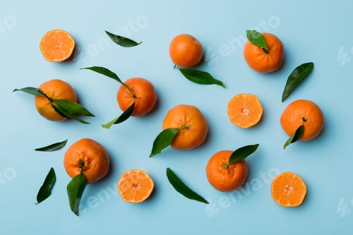 Preview: Many fresh ripe mandarin as colored background, top view. Elegant background