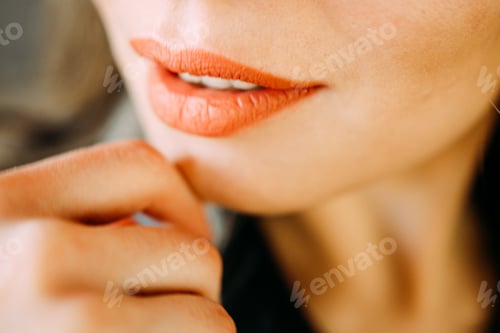 Preview: Close Up of Woman's Face with Orange Lipstick