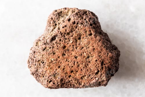 Preview: sample of raw brown pumice mineral on white