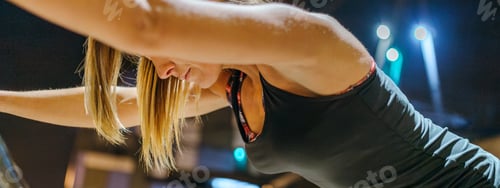 Preview: Banner of unrecognizable exhausted young woman runner resting after training at night