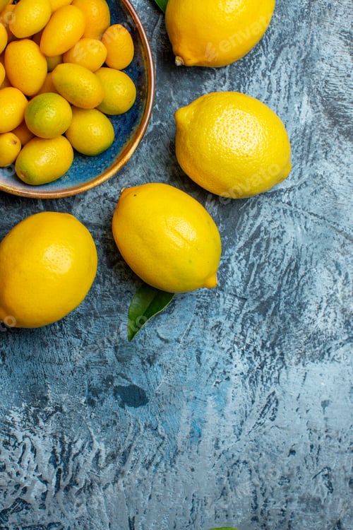 Preview: top view fresh yellow lemons on light-dark background citrus fruit juice tree color