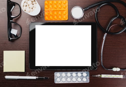 Preview: Medical workspace with tablet, glasses, stethoscope, and medication supplies displayed