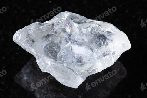 Preview: sample of raw rock crystal mineral on black