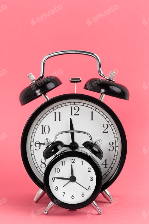 Preview: Vintage alarm clock on a bright pink background