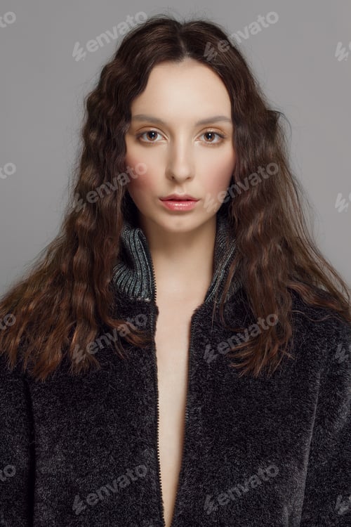 Preview: young fashion model in eco fur coat posing