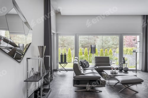 Preview: Comfortable lather sofa in modern living room interior with silver decorations