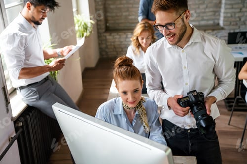 Preview: Creative startup young multiethnic business people working together at designer agency in office