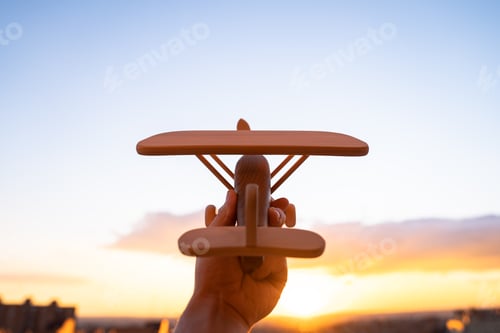 Preview: toy airplane concept ecological flight save the planet sunset light
