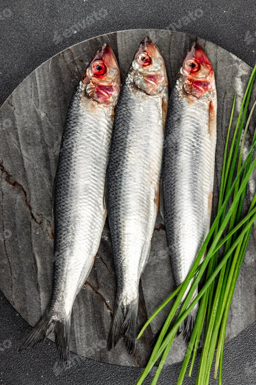 Preview: fish herring fresh raw seafood eating cooking meal food snack on the table copy space food