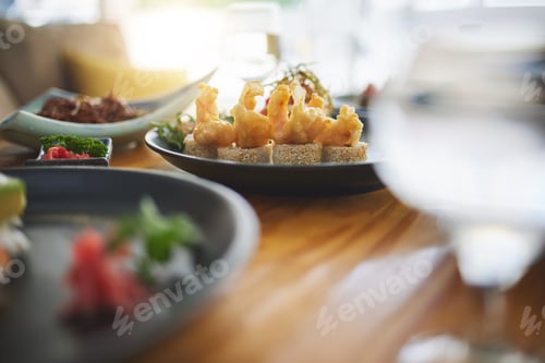 Preview: Sushi restaurant, catering and table in closeup for service, lunch or dinner with wine, glass and f