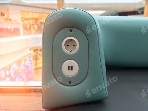 Preview: Electric outlet and usb chargers for phones in furniture at shopping mall