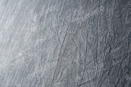 Preview: Abstract grey background design of wrinkled fabric, rough textured backdrop.