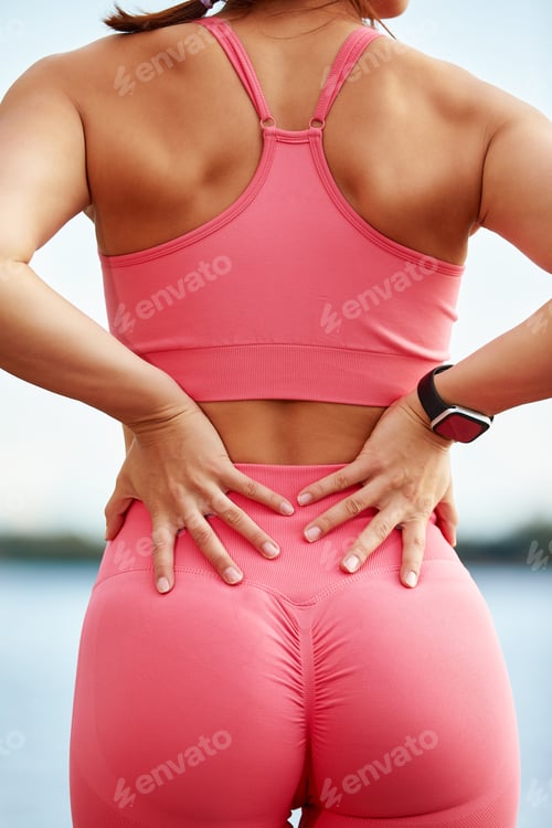 Preview: Young beautiful woman with a slim figure goes in for sports at beach. Fitness, sport and healthy