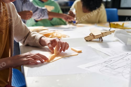 Preview: Schoolgirl Gluing Aircraft Model